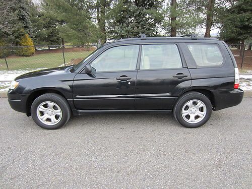 Black 2006 subaru forester 2.5l awd runs like new 1 owner