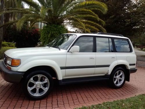 1997, leather interior, towing package, custom rims, satellite radio