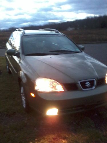 Clean lo 52l 2005 suzuki forenza wagon auto pwr windows cd high mpg nice  !!