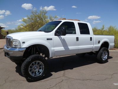 01 f250 crew shorty xlt v10 at 8'lift w/20's lo miles,carfax cert.1 owner beauty
