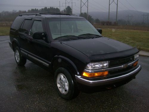 Black, 4wd, automatic,  157k miles