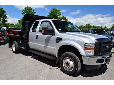 Low miles clean car fax dump body 4x4 v-10 gas boss v-plow automatic supercab