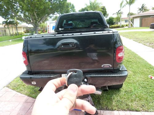 Used 4 wheel drive ford trucks #2