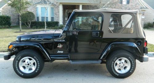 Jeep wrangler sahara 2002 black tan good condition 85,000 miles good condition