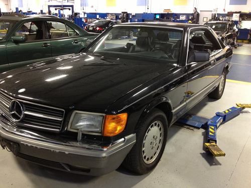 Black on black 1990 mercedes 560sec