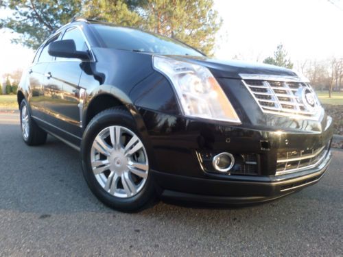 2011 cadillac srx/ navigation/ dvd/ back up camera/ panoroof/ leather/ low mile