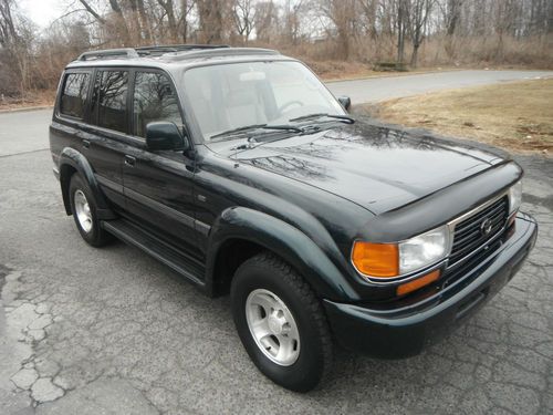 97 toyota land cruiser 143000 miles no rust runs 100% needs nothing