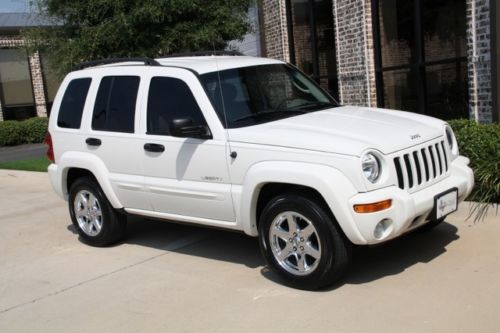 White, taupe leather, 17-inch chrome wheels, heated seats, infinity sound, nice!