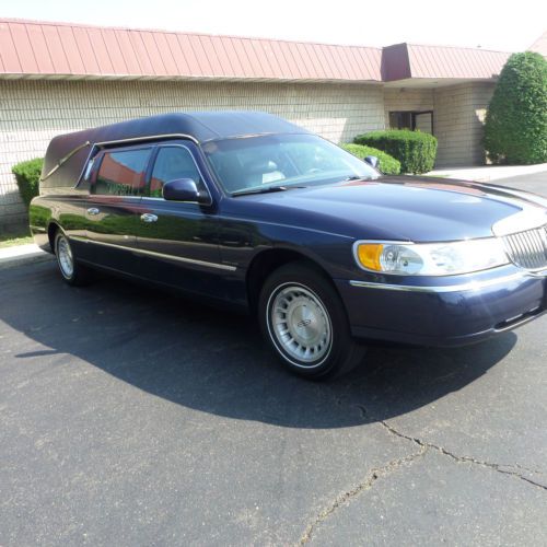 1999 dark blue lincoln town car executive hearse