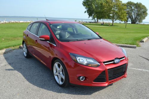 2012 ford focus titanium/leather navi/backupsensors moonroof/rebuilt no reserve