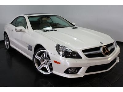 Sport package, convertible panoramic hard top, amg wheels, navigation