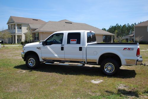 Like new!  2004 ford f-250 xlt crew cab 4x4 fx4 w/ triton v10