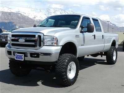 Crew cab xlt lariat 4x4 powerstroke diesel longbed custom lift wheels tires