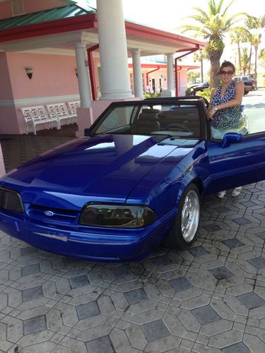 1991 mustang convertable, a real looker, runs great. beautiful paint job