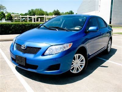 Corolla xle,sedan,power sunroof,wood grain,sat/aux,non smoker,runs great!!