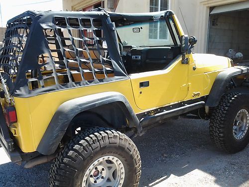 2000 jeep tj ,6 inch long arm w/ 37 tires,low miles