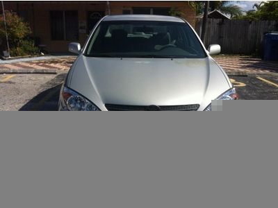 Silver 2003 toyota camry le one owner mileage:70,295 no accidents no reserve