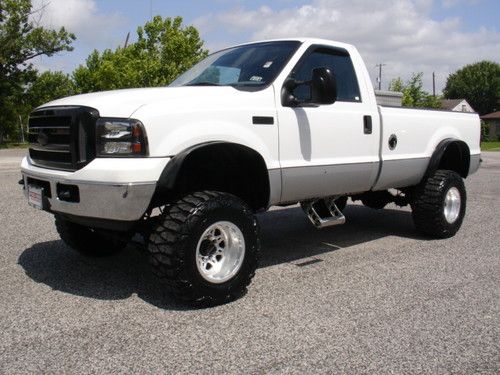 Lifted 4x4 7.3l v8 diesel 6-speed nitto mud grappler k&amp;n intake mbrp exhaust