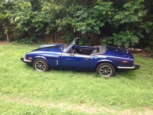 1975 triumph spitfire 1500, excellent condition, no rust, a bunch of extra parts