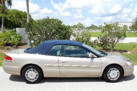 New tires~new cloth top like limited~27 mpg's~chrome~nicest one!! 04 05 06