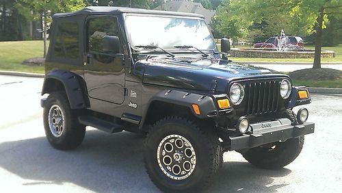 2003 jeep wrangler sahara 4.0l automatic low miles and extremely nice