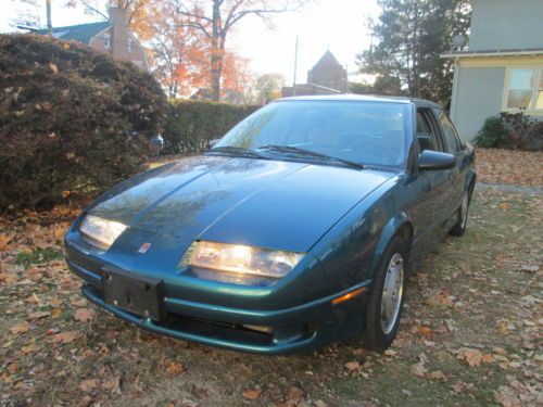 1993 saturn sl2  auto 93k miles  wow!! very clean runs great l@@k u might buy ~!