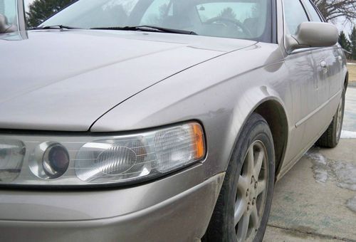 2003 cadillac sls cashmere ext, beautiful shale leather int.  nice car