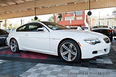 All original, low miles, white/black coupe.