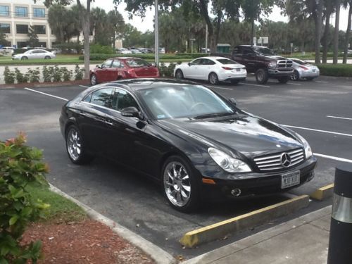 Mercedes benz 500 cls  beautiful black exterior with tan interior.