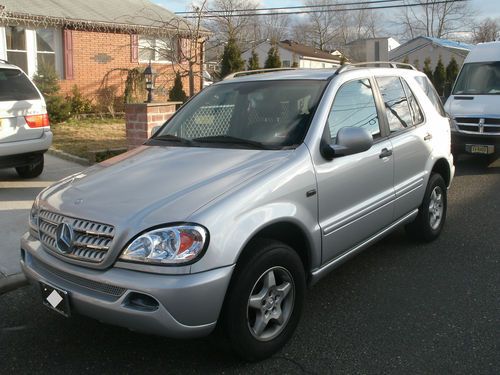 Mercedes ml 320, no  reserve ,4x4, suv,awd, silver ,black seats,low mile