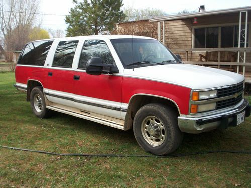 1992 red and white chevy suburban 2wheel drive 3/4 ton 454 engine