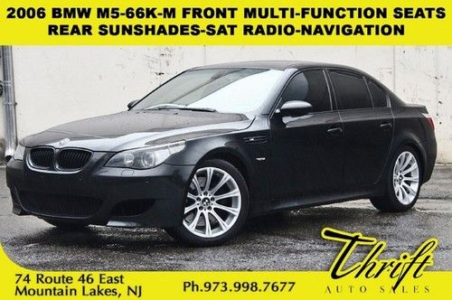 06 m5-66k-m front multi-function seats-rear sunshades-sat radio-nav-window tints