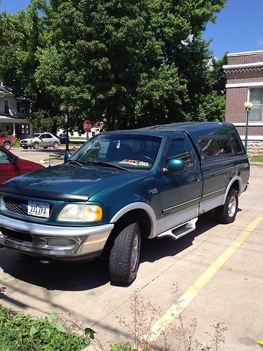 Ford f-150 4wd longbed with topper