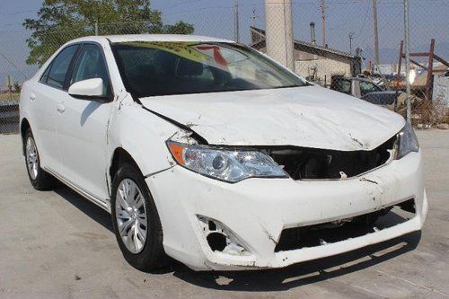 2012 toyota camry le damaged junk title low miles nice unit economical wont last