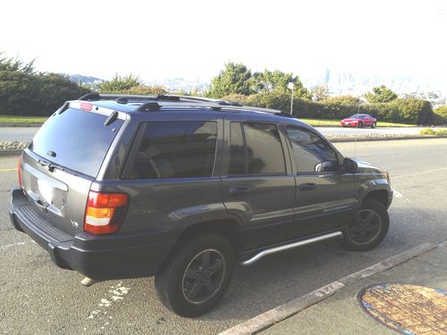 Laredo, 8cyl 4.7l ho, charcoal grey, very low miles, upgraded leather interior