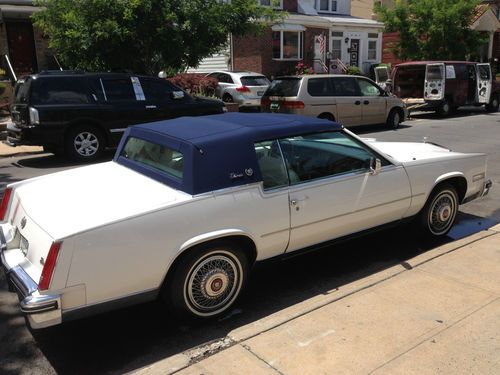 1984 cadillac eldorado, white, white leather interior, royal blue ragtop, 54k mi