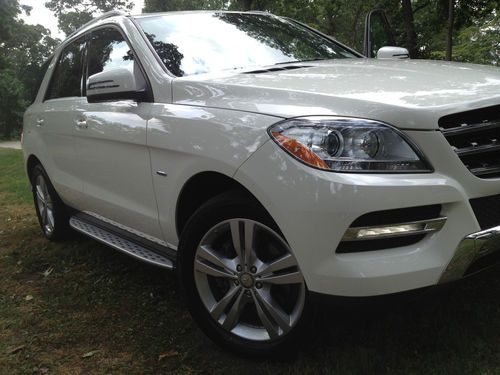 Mercedes-benz ml350 showroom condition only 12k miles fully loaded