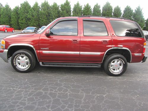 2002 gmc yukon 4x4 slt 3rd row. runs great clean. cell 678-283-8300