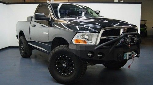 Highly customized, iron bull bumpers, piaa lights, warn winch, we finance!