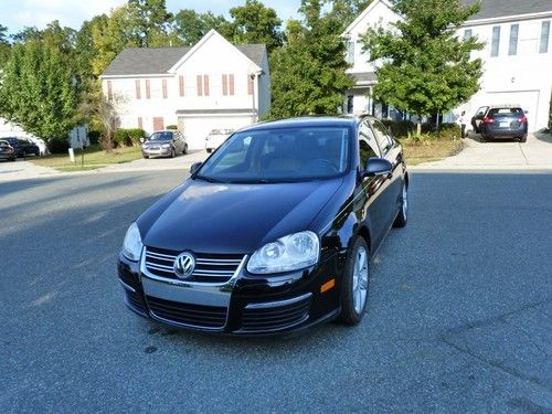 2009 vw jetta,auto,ice cold air,one owner,black,wow!!!