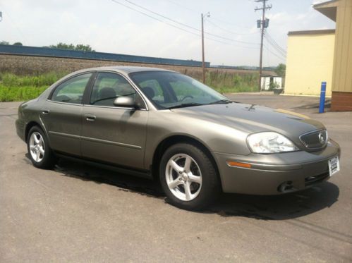 Spruce green metallic 4 door sedan gray interior very clean carfax guaranteed