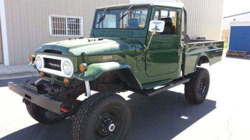 1965 toyota land cruiser fj45. $75k build. 1 of a kind. green goblin.