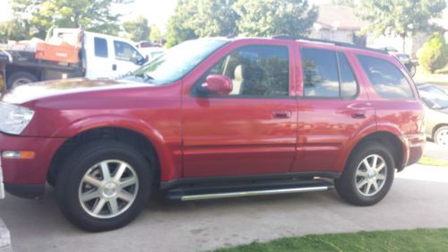 Red 2004 buick rainier