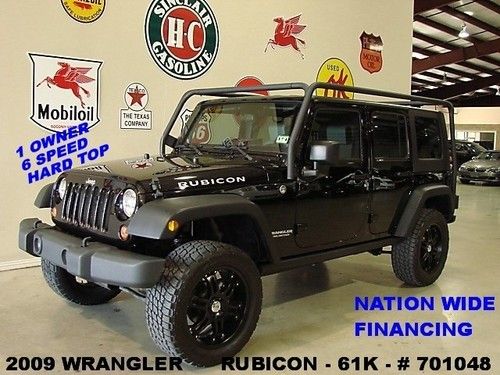 2009 unlimited rubicon 4x4,6 speed trans,2in lift,nav,20in whls,61k,we finance!!