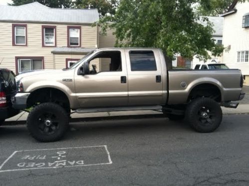 2002 ford f-250 super duty lariat crew cab pickup 4-door 7.3l lifted