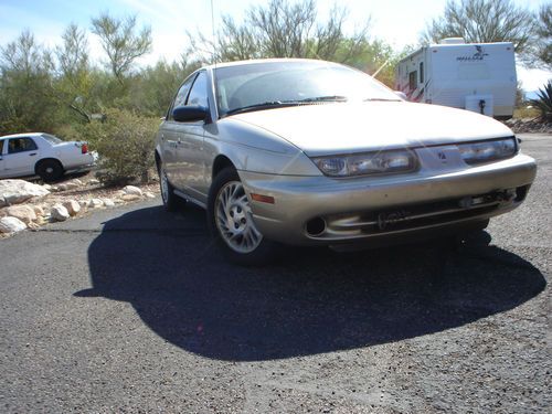 1998 saturn sl2 sedan low miles ~~ leather, moon roof, ice cold a/c no reserve