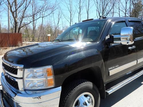 2011 chevy dually 3500 hd , black with cocoa cashmere interior ltz package