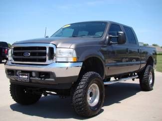 02 ford f250 super duty lariat 7.3 v8 diesel! in super good shape lots of extras