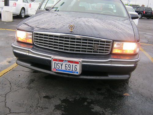 Cadillac deville 1995 sadan dark blue clean  needs work start bid $1,200.00