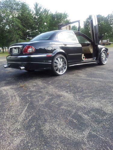 2004 jaguar x type- 20"rims,lambo doors,underglowneon lights,chrome exhaust,tv's